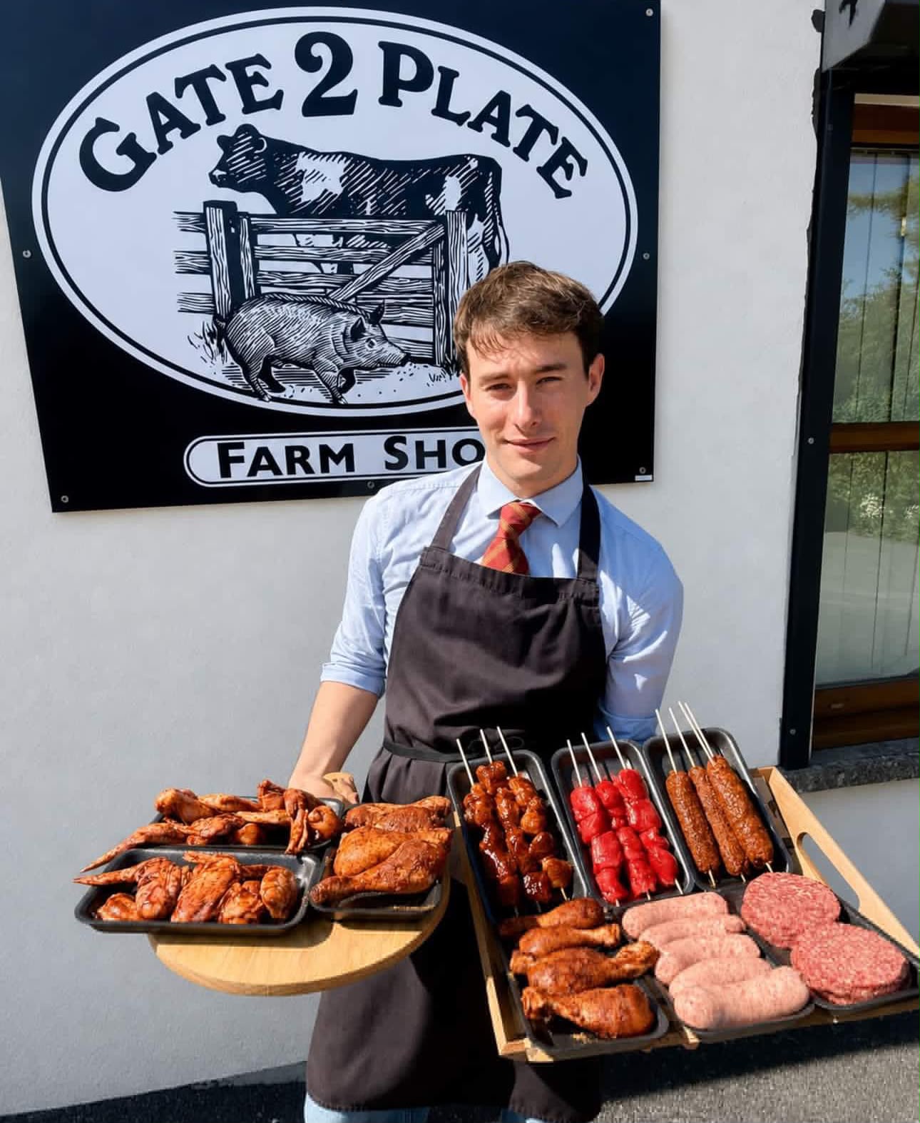 Our butcher at the shop counter